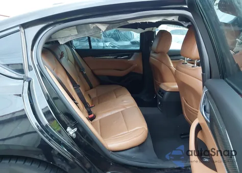 2023 Cadillac Ct5 Sport from USA, damaged, VIN 1G6DP5RK7P0115657